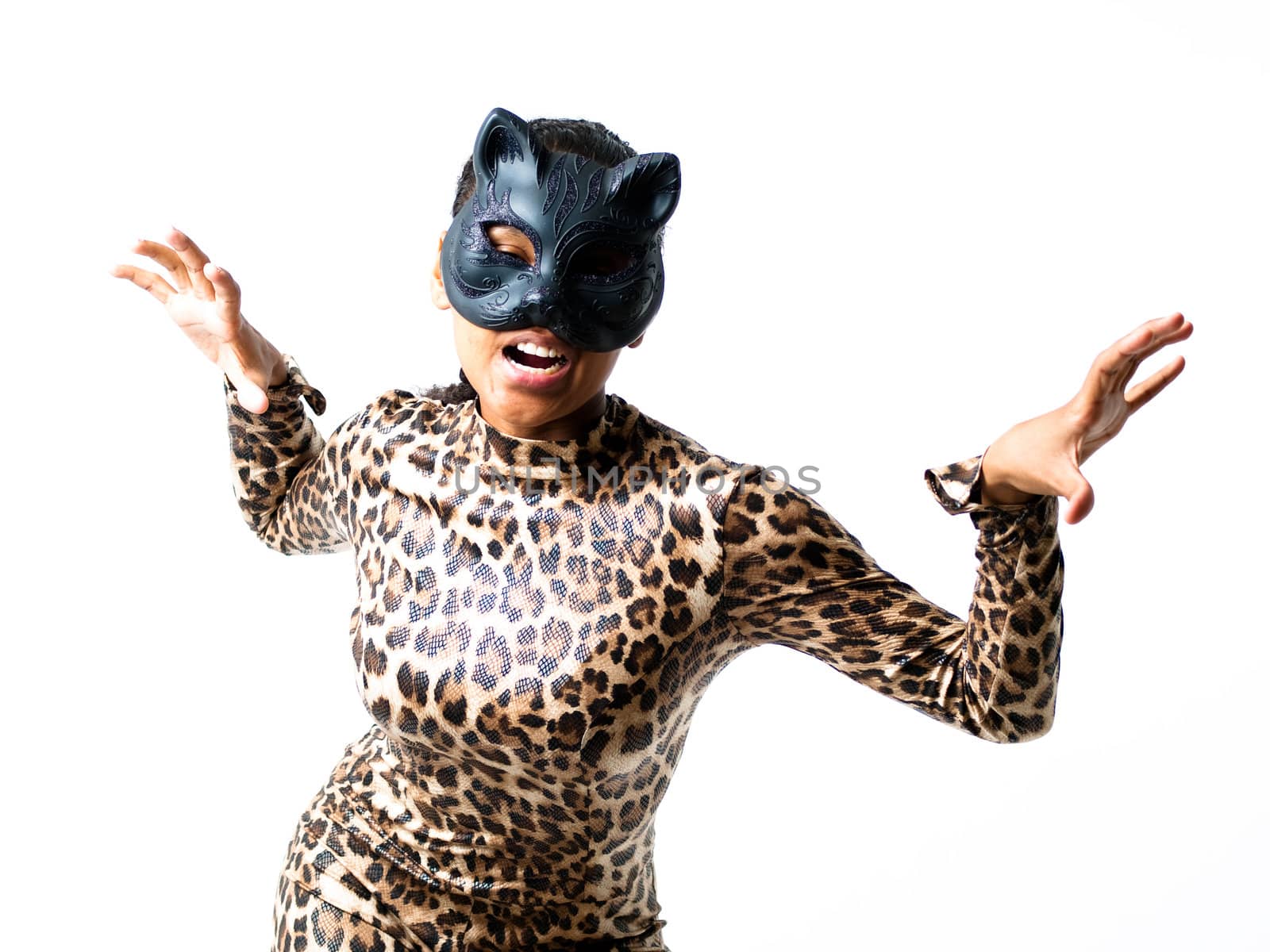 Dancer dressed in a leopard suit and cat mask; attacking and aggressive