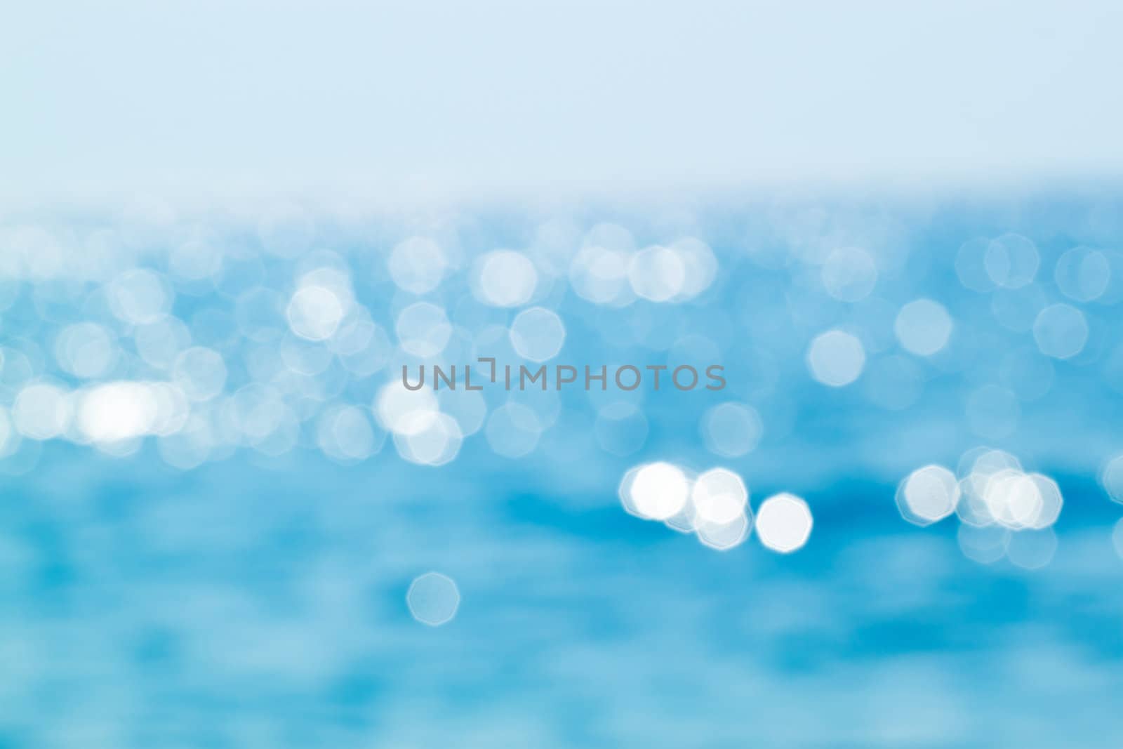 Abstract blue sea bokeh for background use by artush