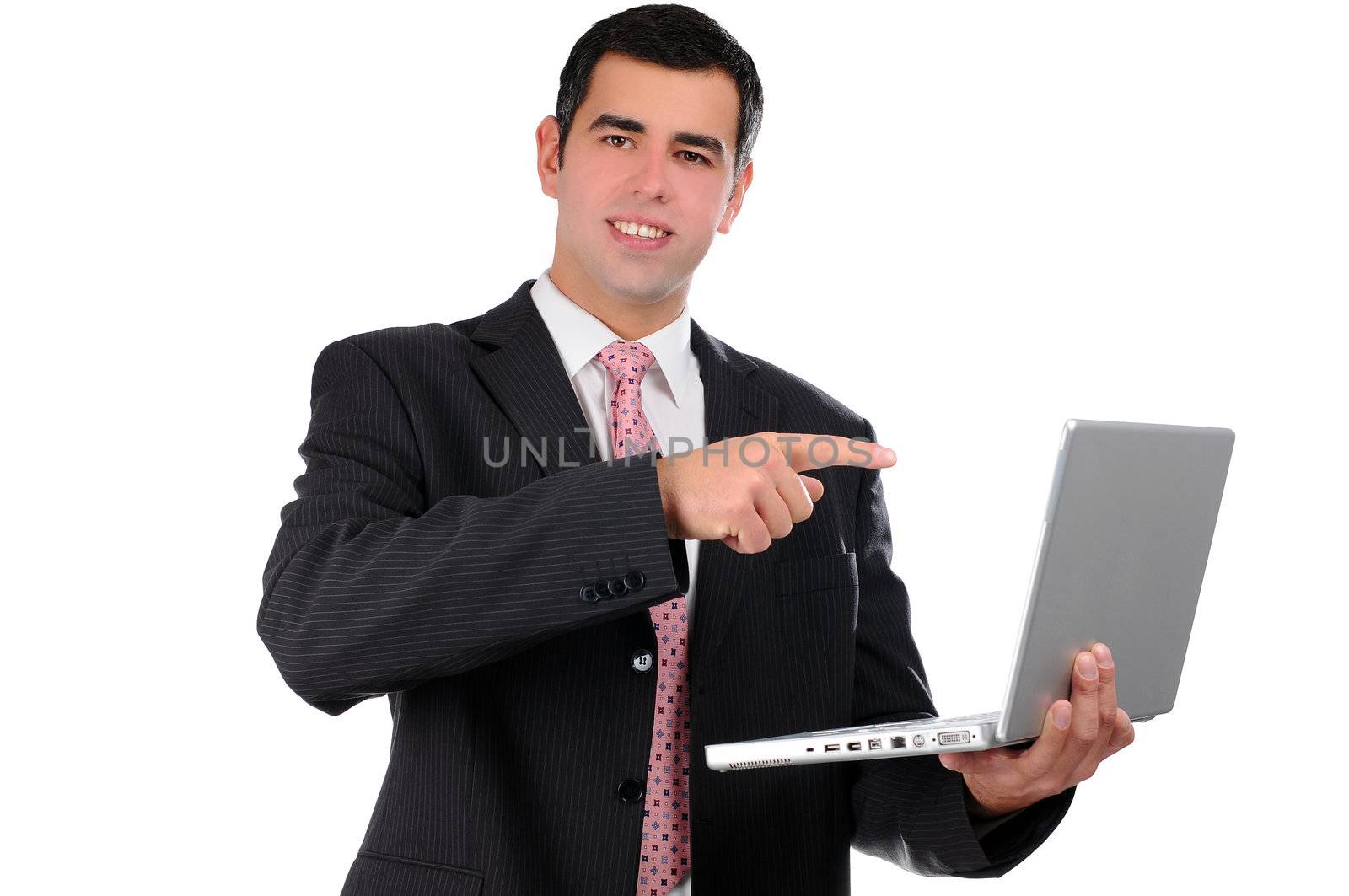 Close up of young businessman holding laptop poining finger on it