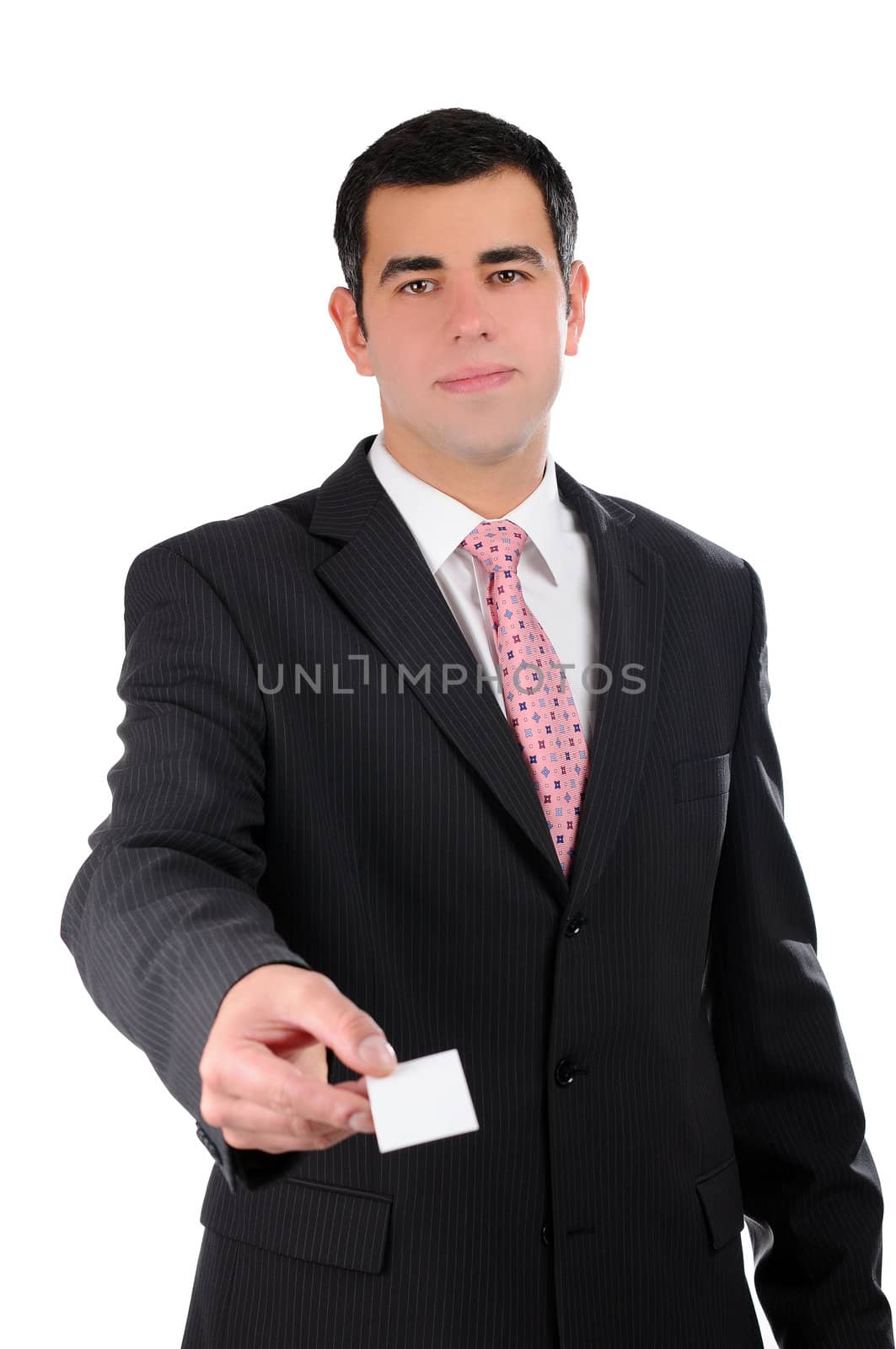 Businessman smiling handing a business card by gravityimaging1