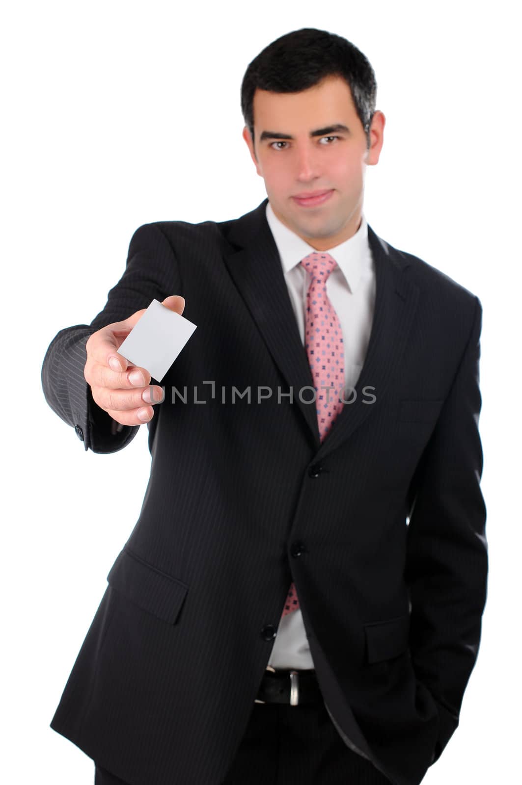 Businessman smiling handing a business card by gravityimaging1