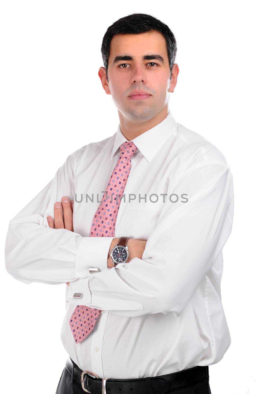 Portrait of a confident young businessman in a white shirt with pink tie isolated on white