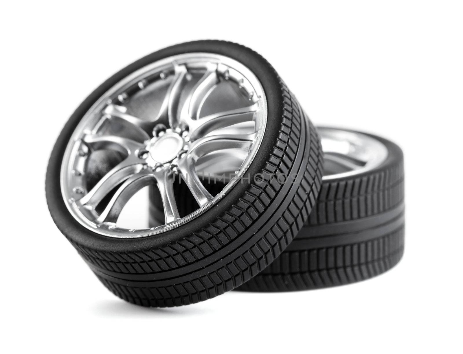 Car wheels on white background.