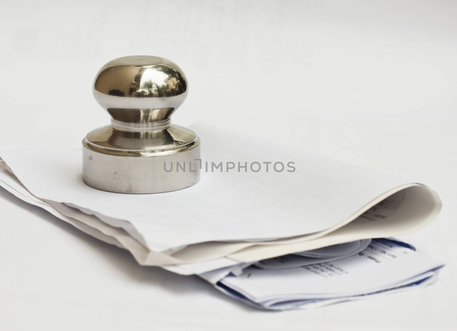 A stainless steel weight to prevent document from being blown off