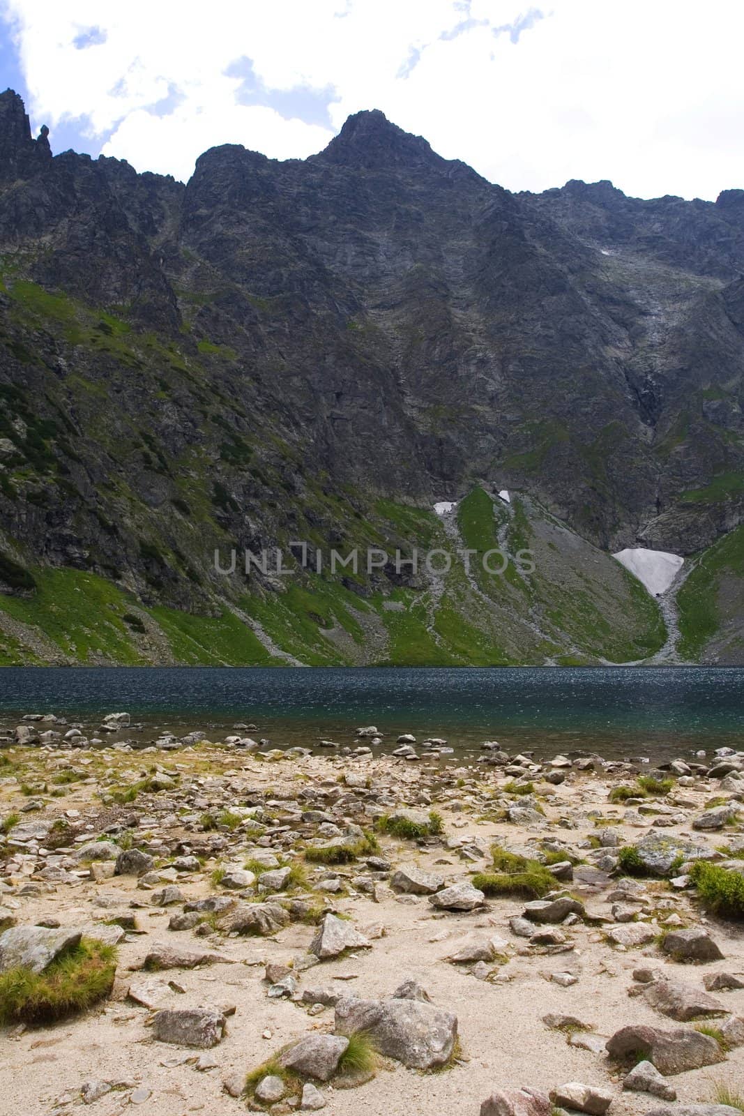 Mountain located on the lake by shiffti