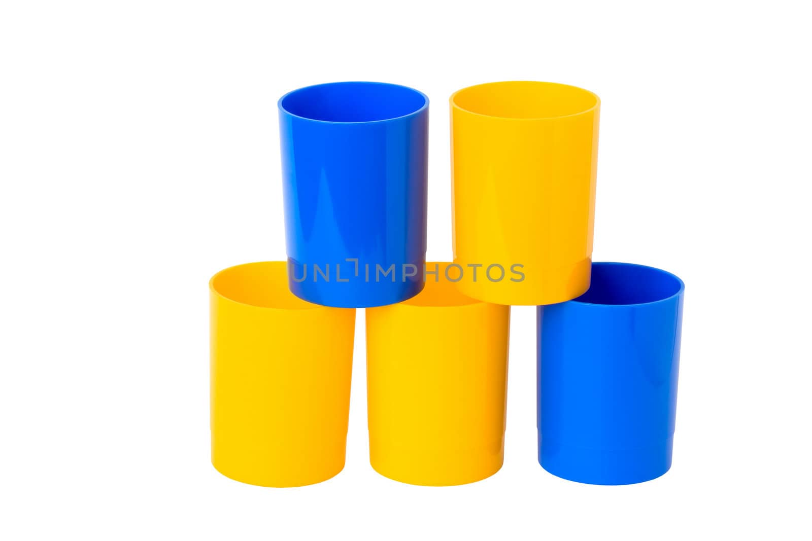 Five colored plastic cups, isolated on a white background.