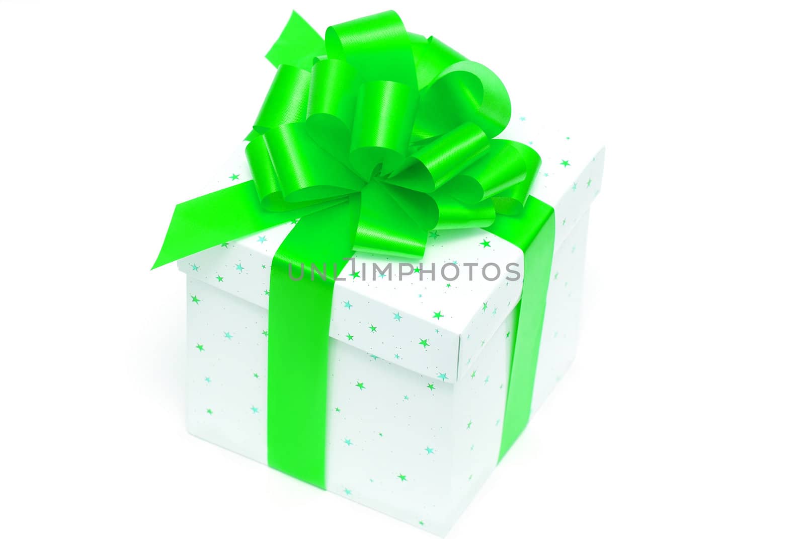 White gift box with green ribbon isolated on white