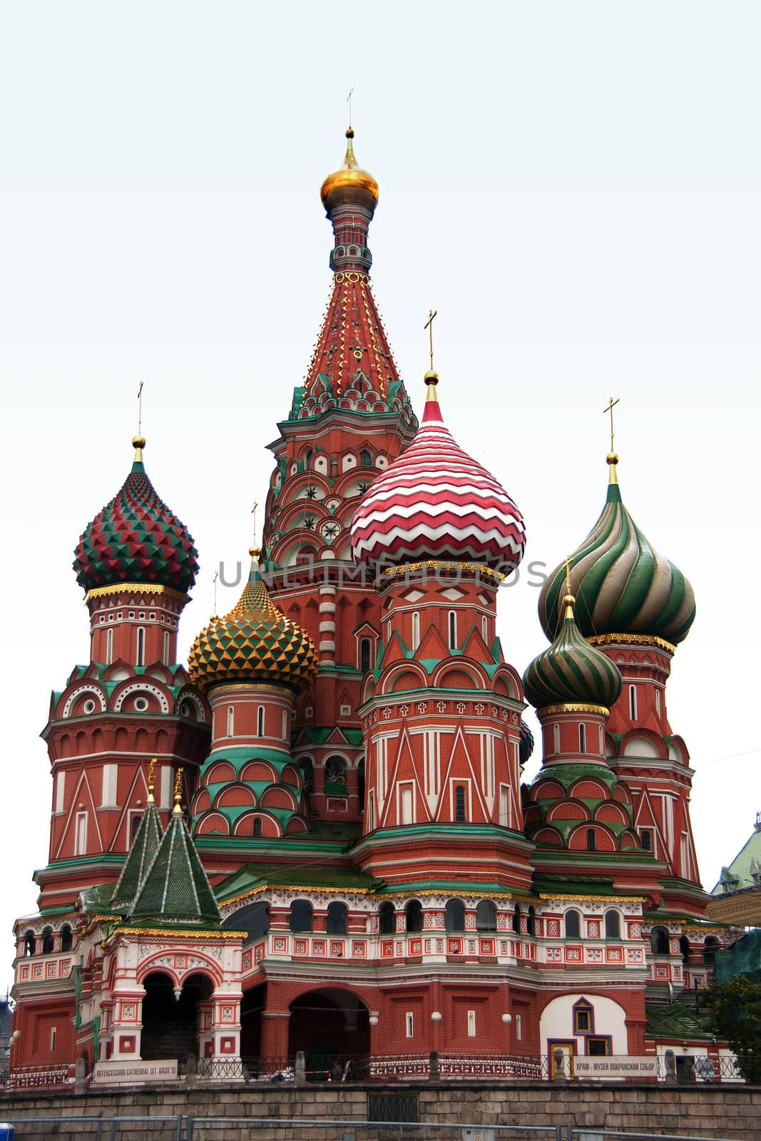 The towers of Saint Basil's Cathedral isolated against a light blue morning sky. by Claudine