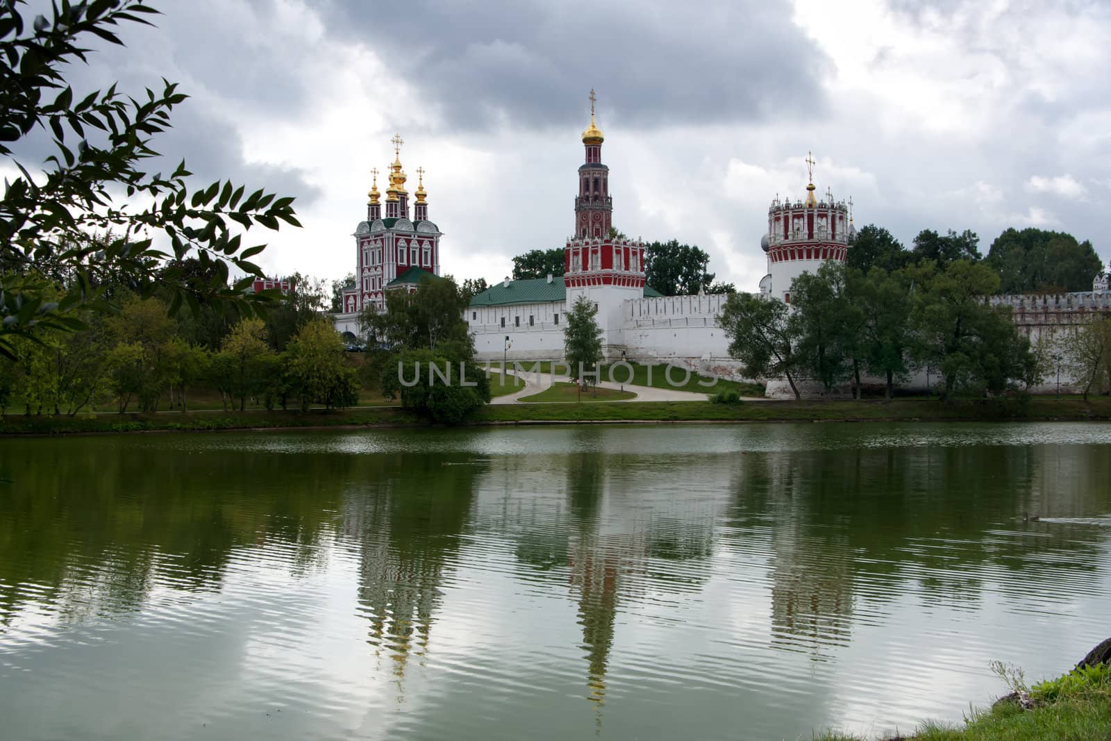 Novodevichy Convent reflects in the lake. by Claudine