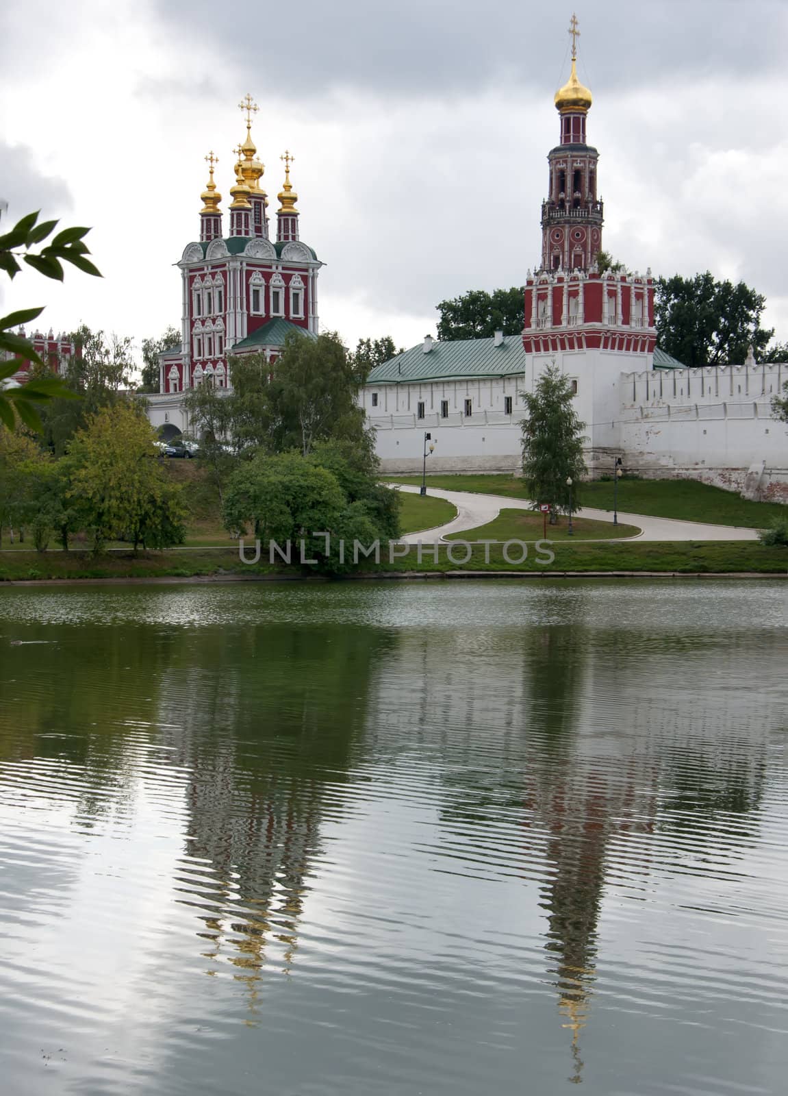 Novodevichy Convent reflects in the lake - portrait style. by Claudine
