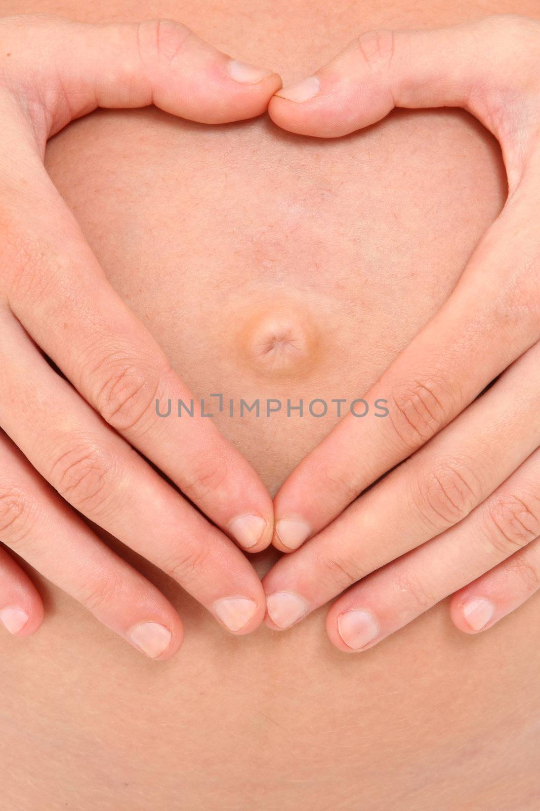 Pregnant Belly with Heart Shape Hands by duplass