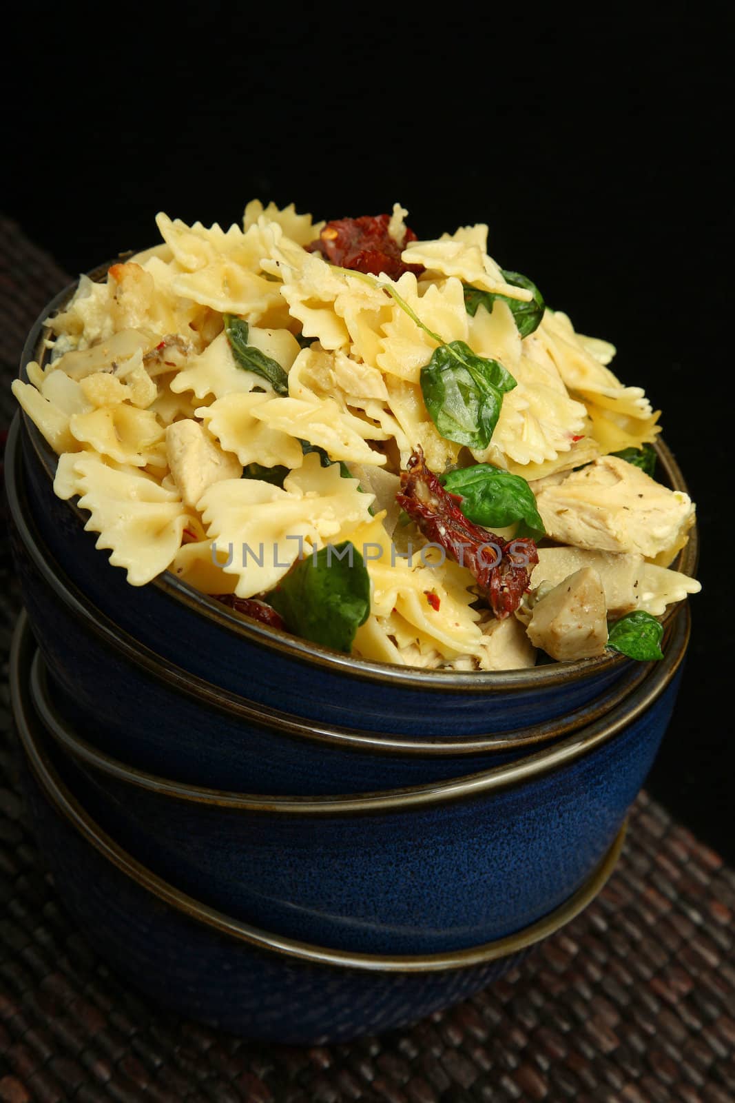 Homemeade chicken florentine artichoke bake pasta dish.