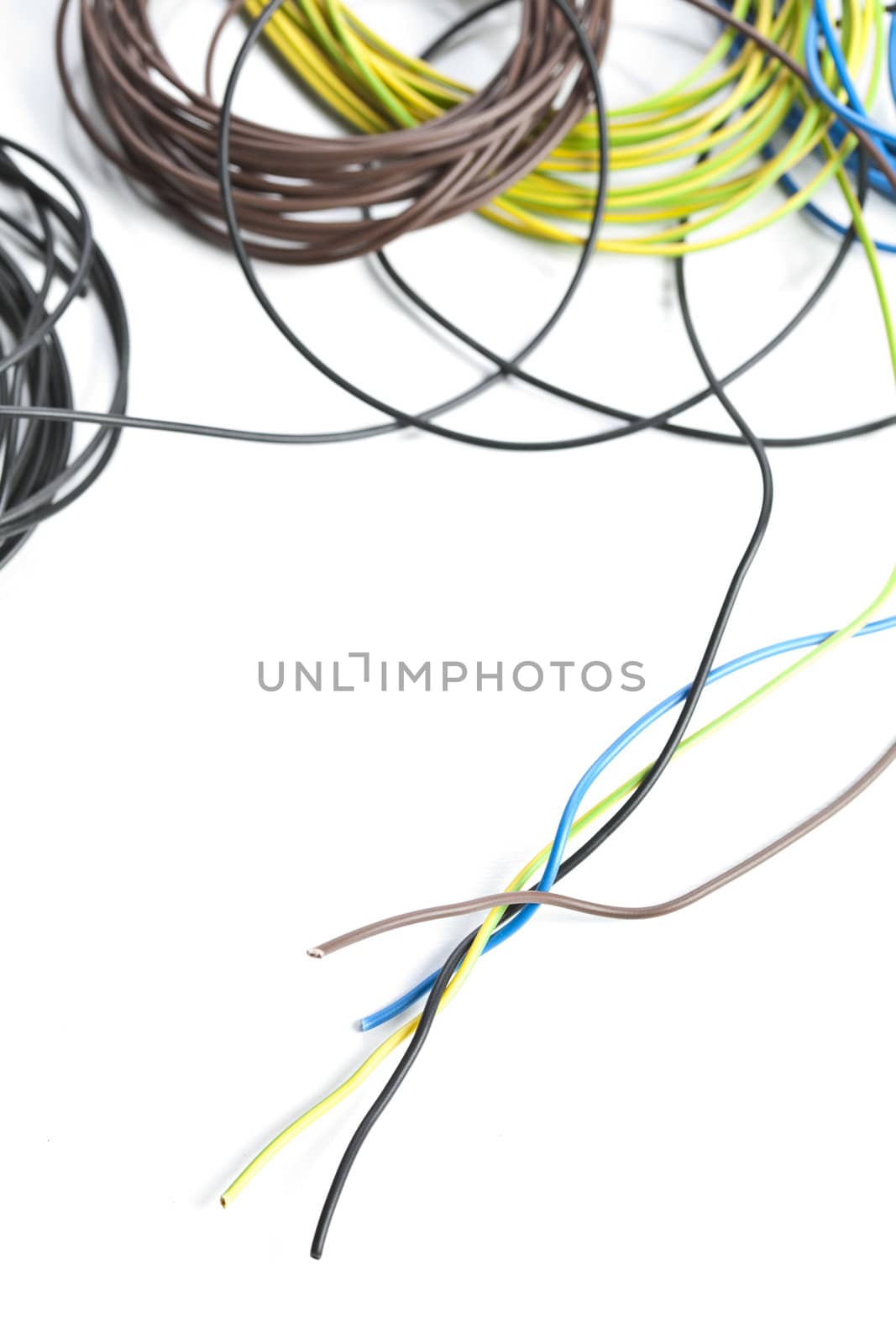 Colorful coils of cables on a white background