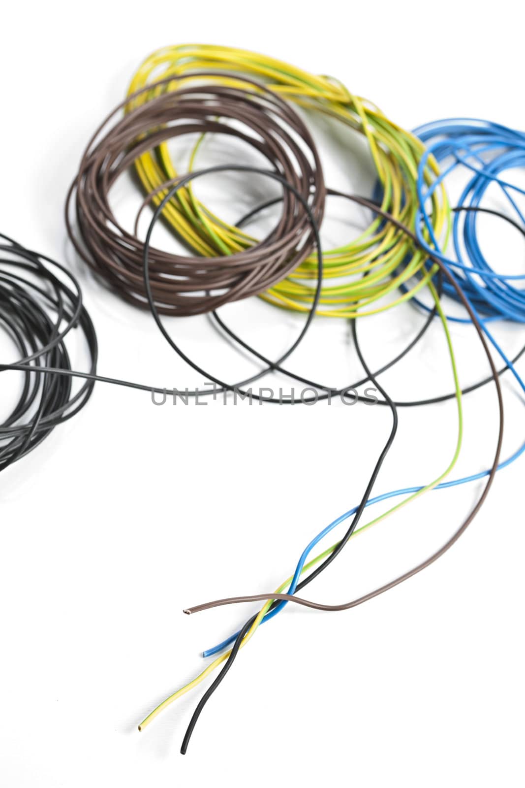 Colorful coils of cables on a white background