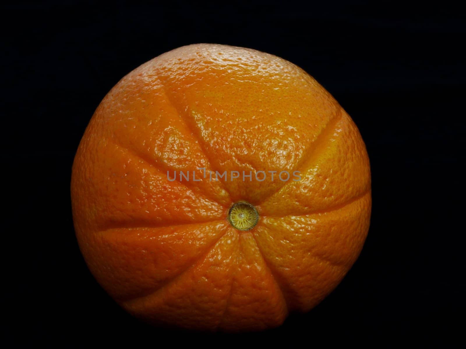 Orange fruit isolated on black background