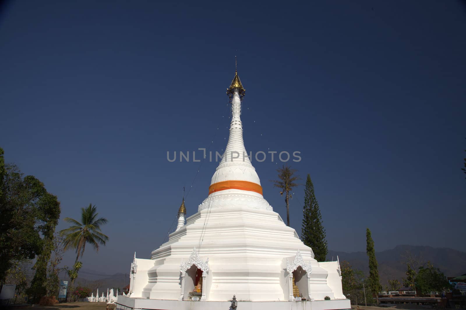 White Pagoda or temple against a blue sky Pagoda by Farina6000