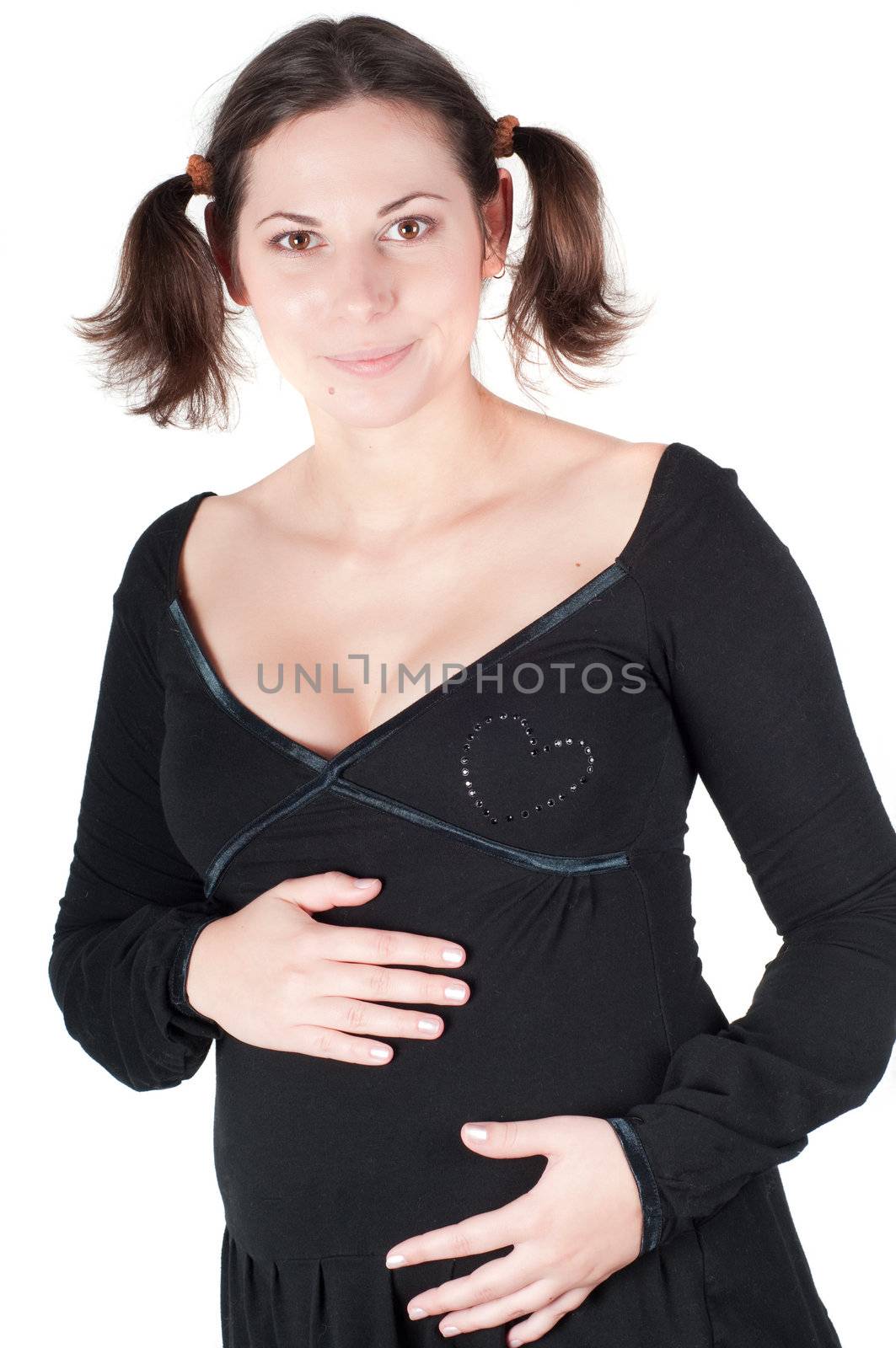 Portrait of pretty pregnant woman in black dress isolated on white