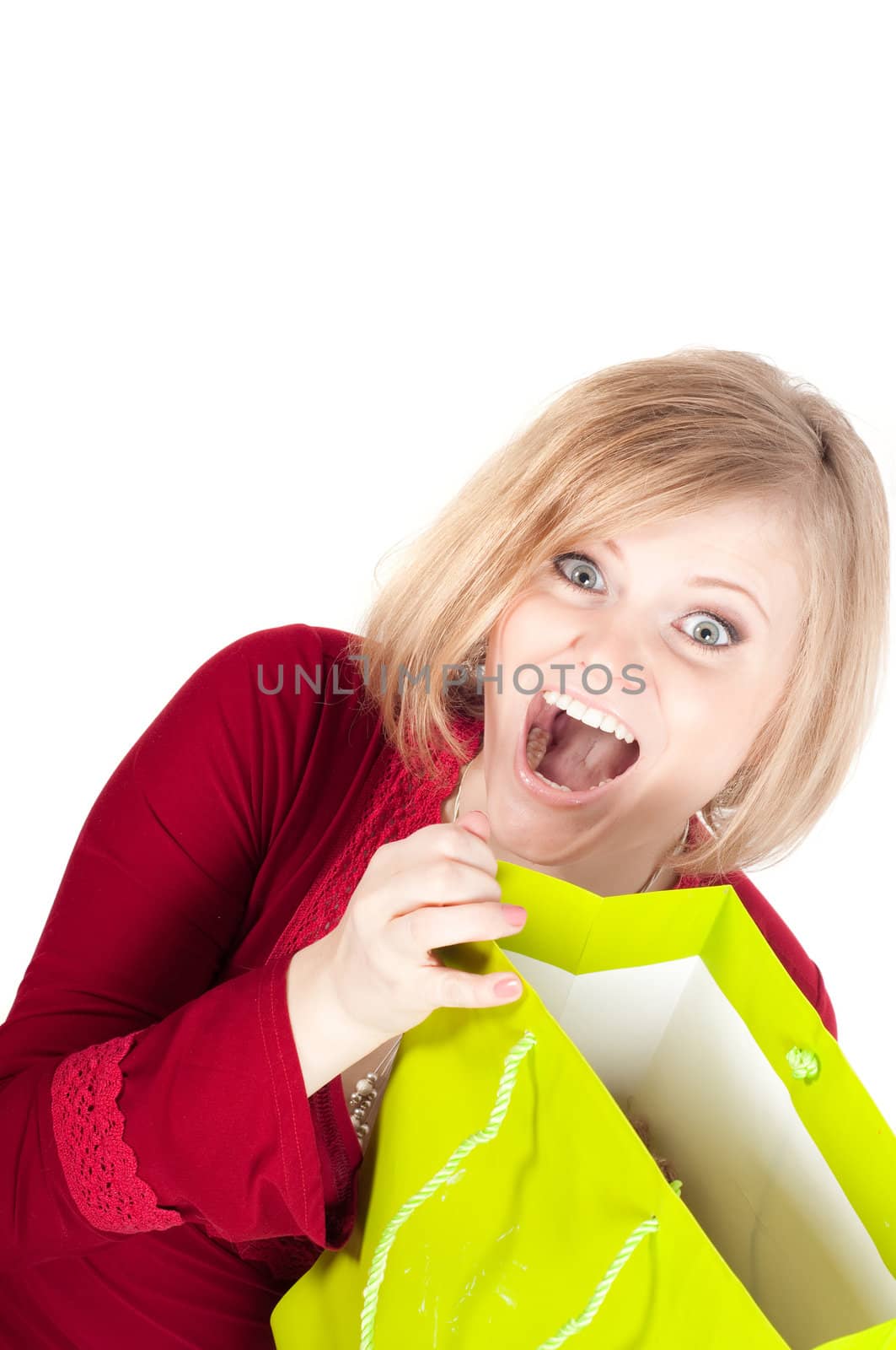 Beautiful woman with shopping bags isolated onwhite