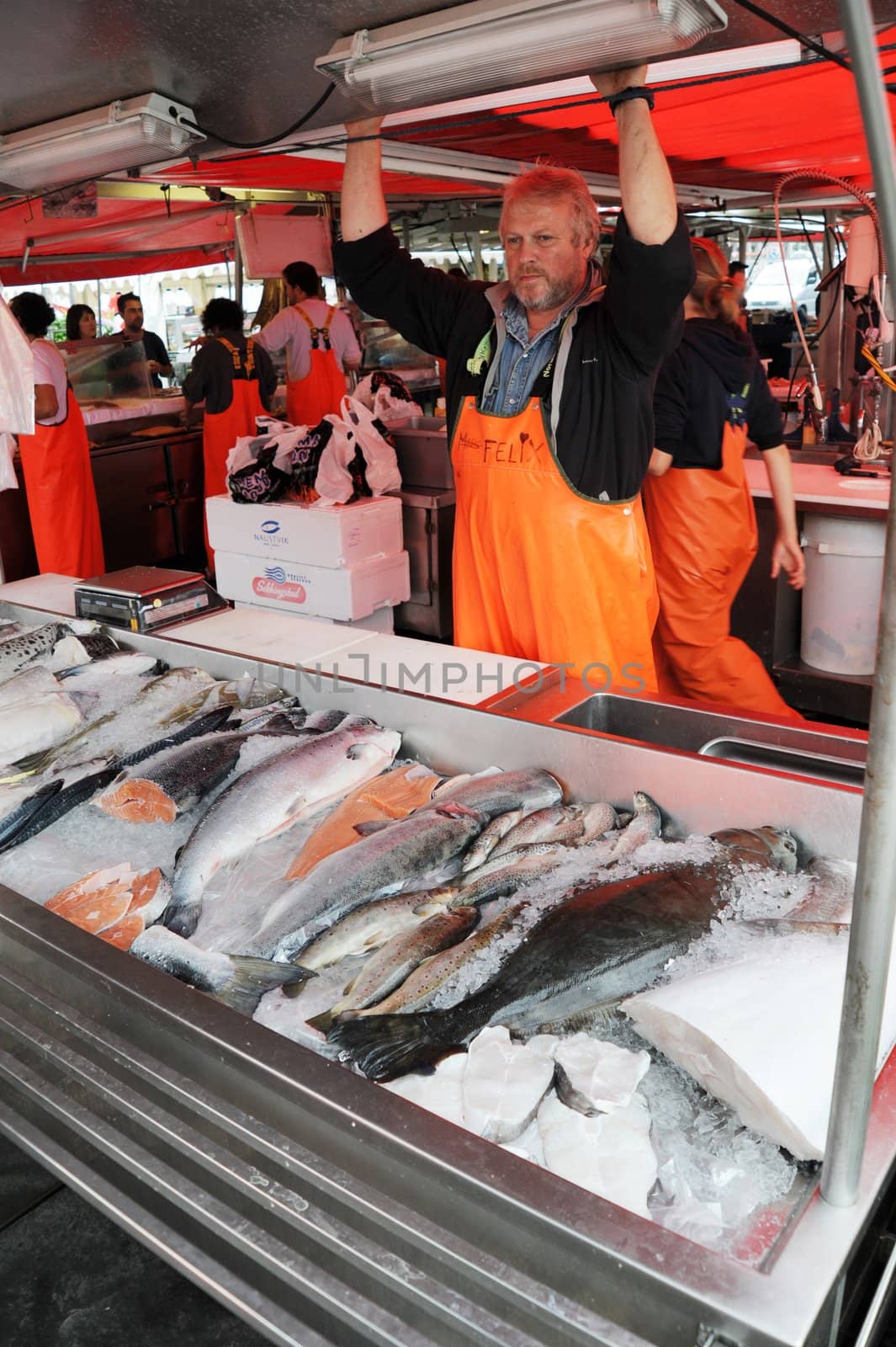 seller at a fish market in Bergen. Norway 