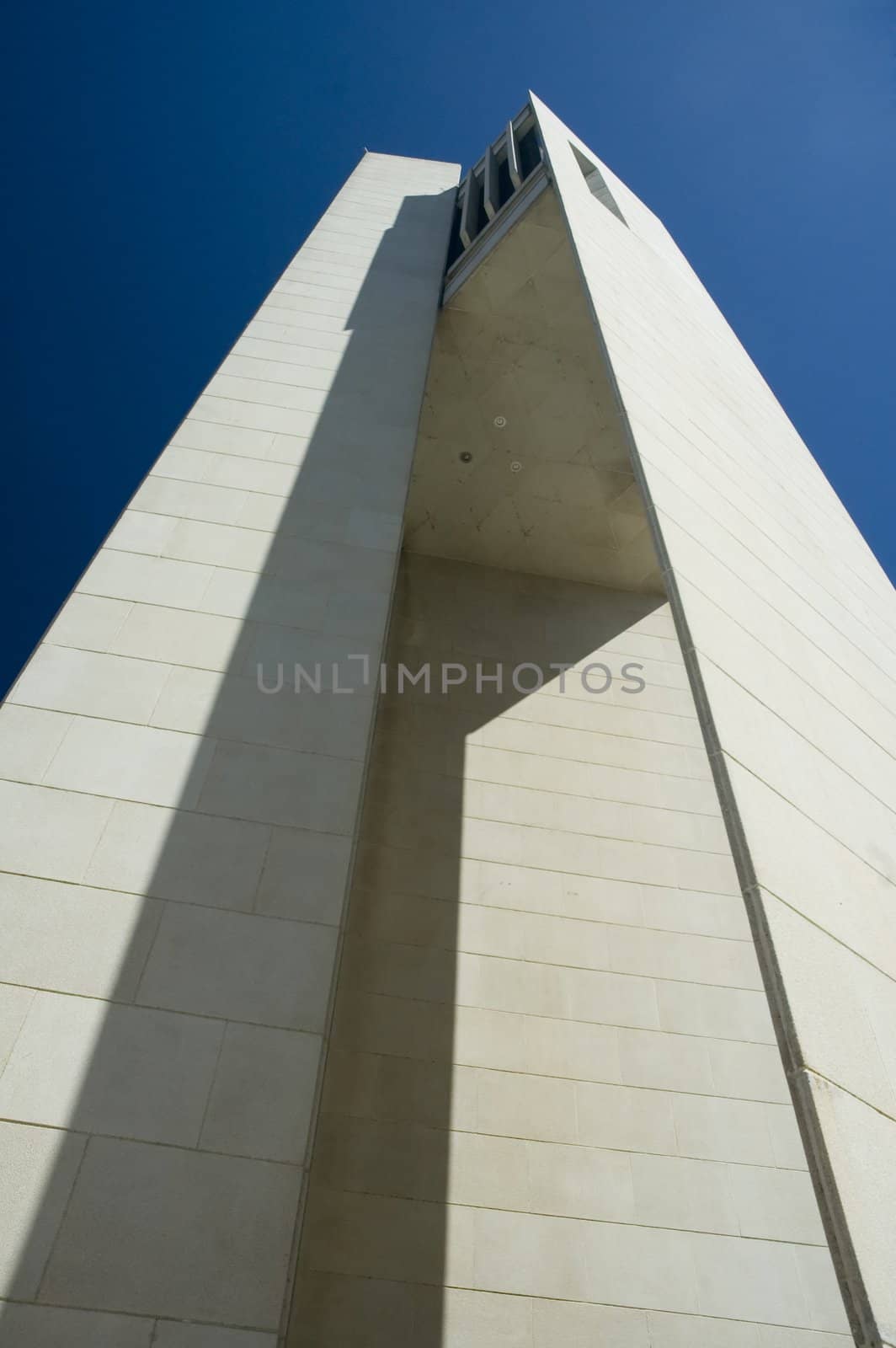 Modern Carillion in Canberra, photo taken under it, clear blue sky