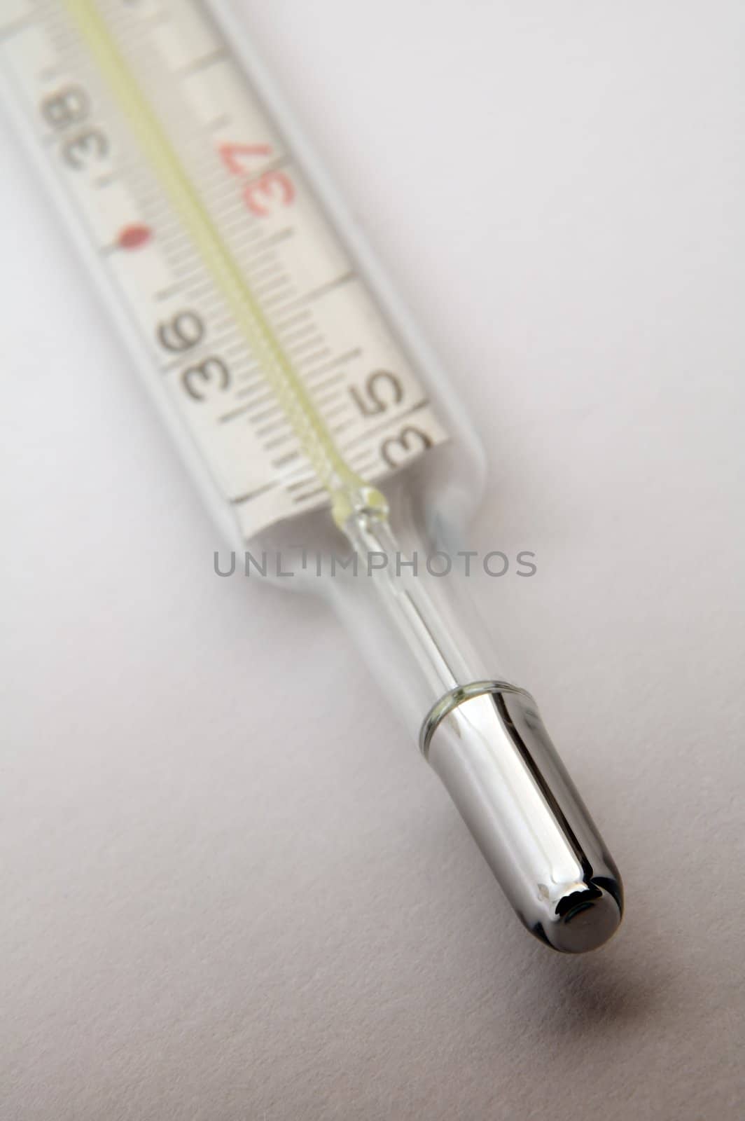 clinical thermometer on white background, distance blur