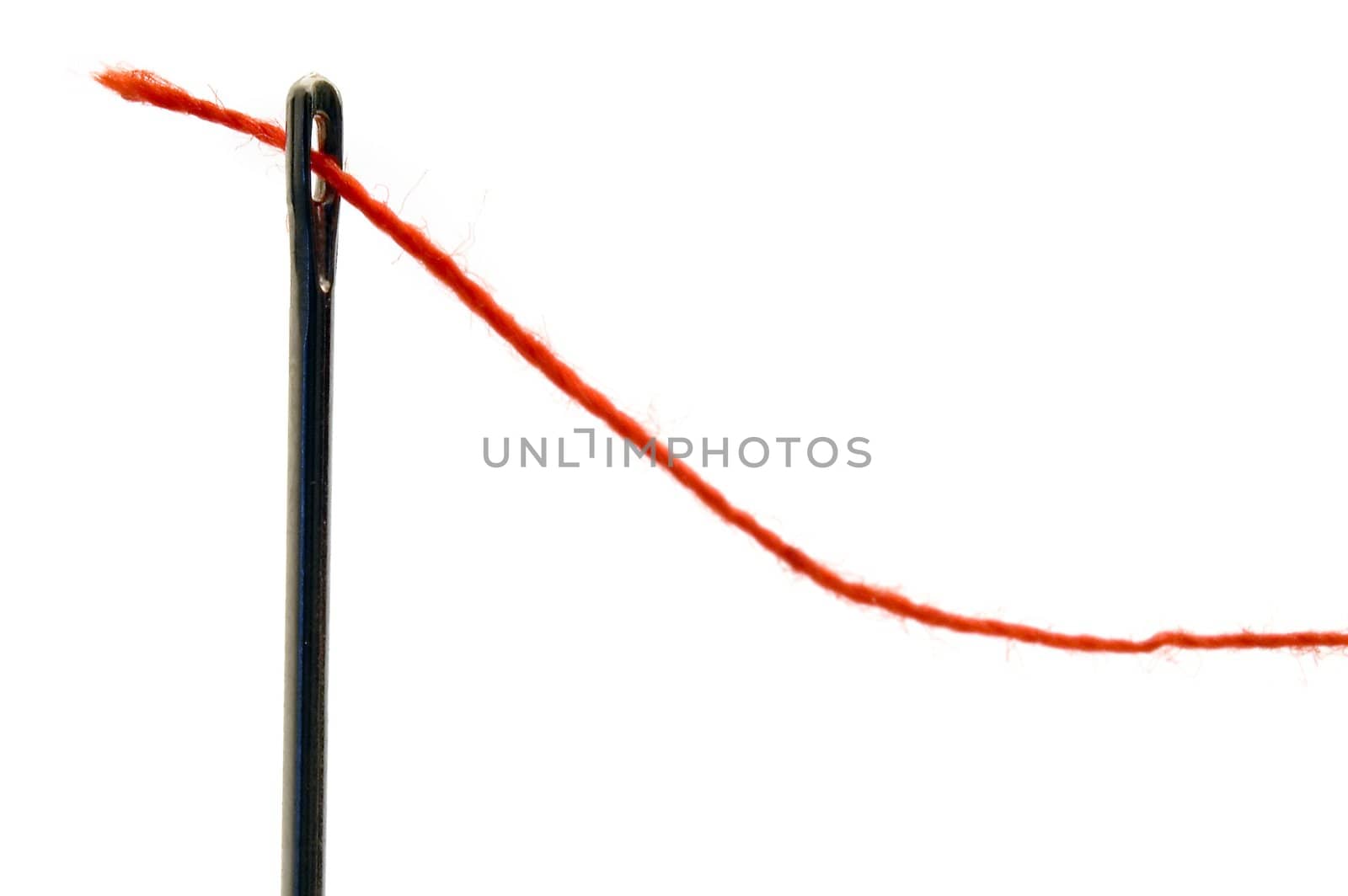 needle and red fibre isolated on white background