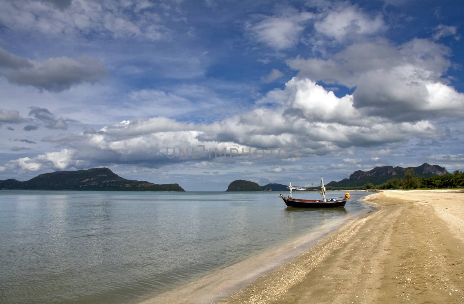 Boat on tropical beach