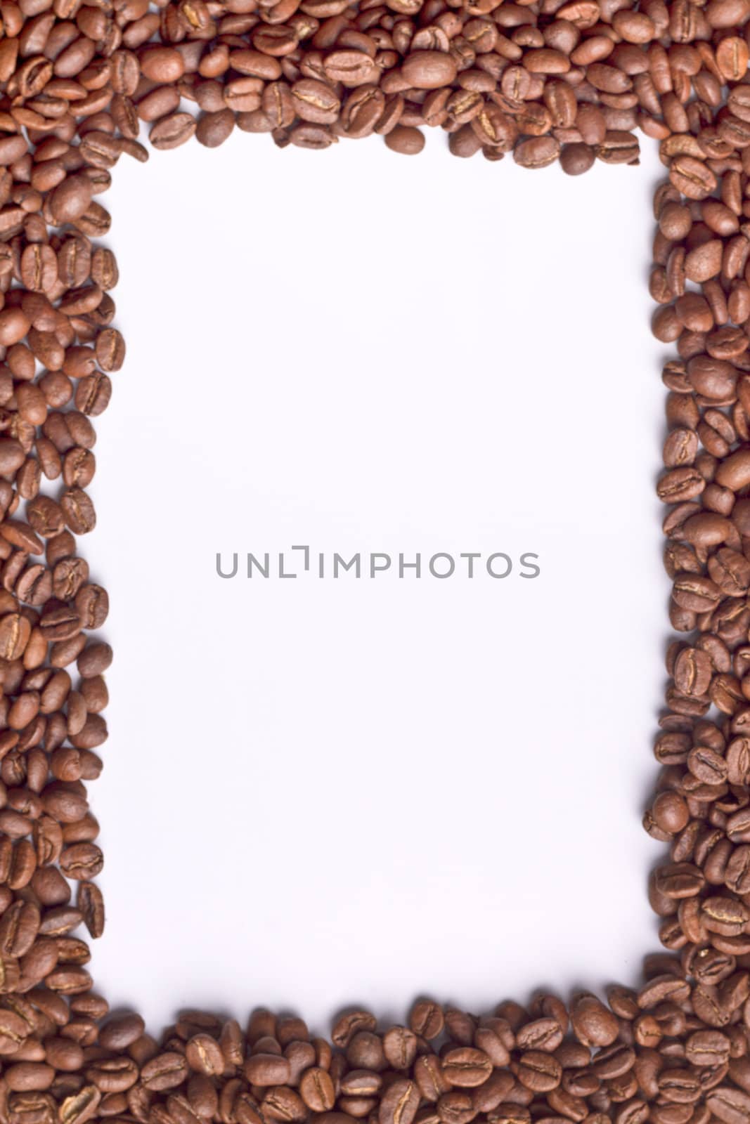 Frame with white inner area made of coffee beans