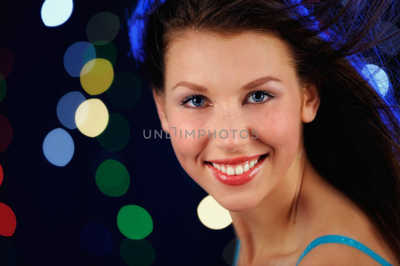 Beautiful young brunette woman with attractive smile