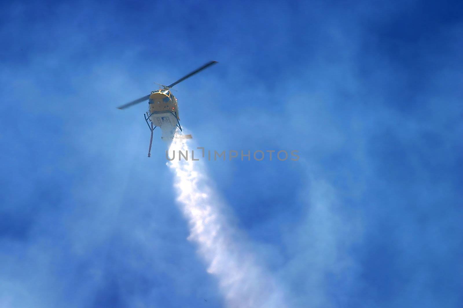 Brush fire in Ventura, California. The fire consumed 25 acres and was quickly controlled by more then 100 firefighters and water dropping helicopters.