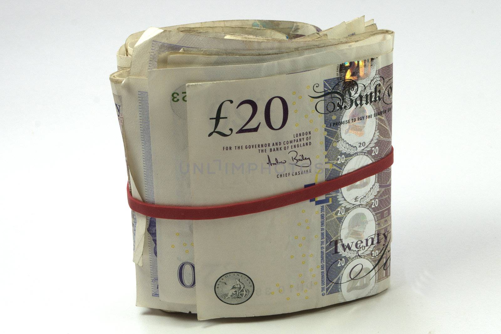 Bundle of twenty pound notes with elastic band