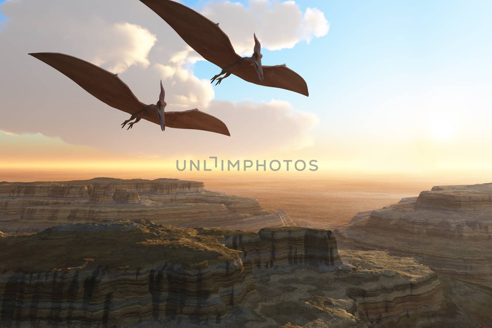 Two Pterodactyl flying dinosaurs soar above a beautiful canyon.