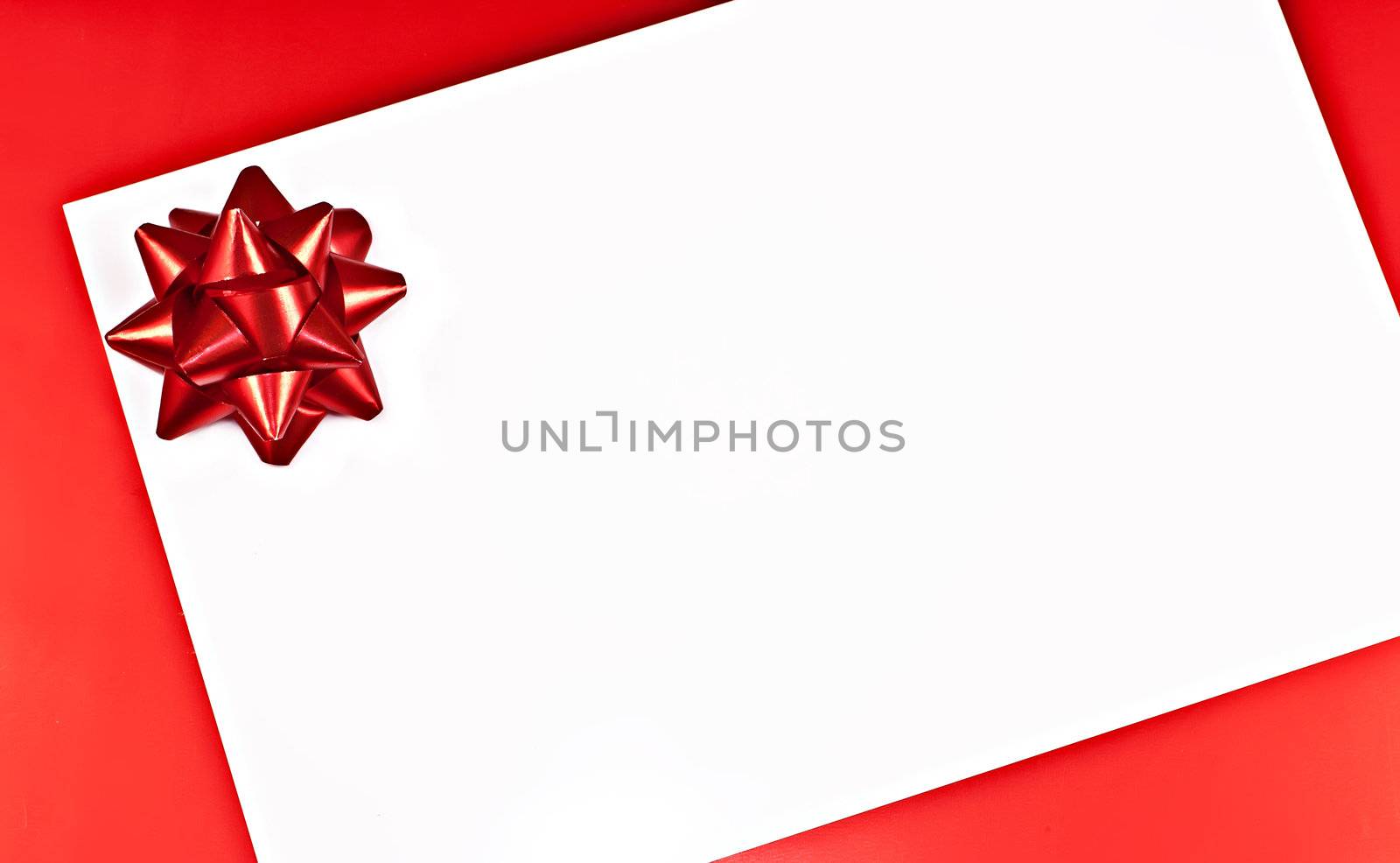 On a red background white greeting card with a red Bantu.
