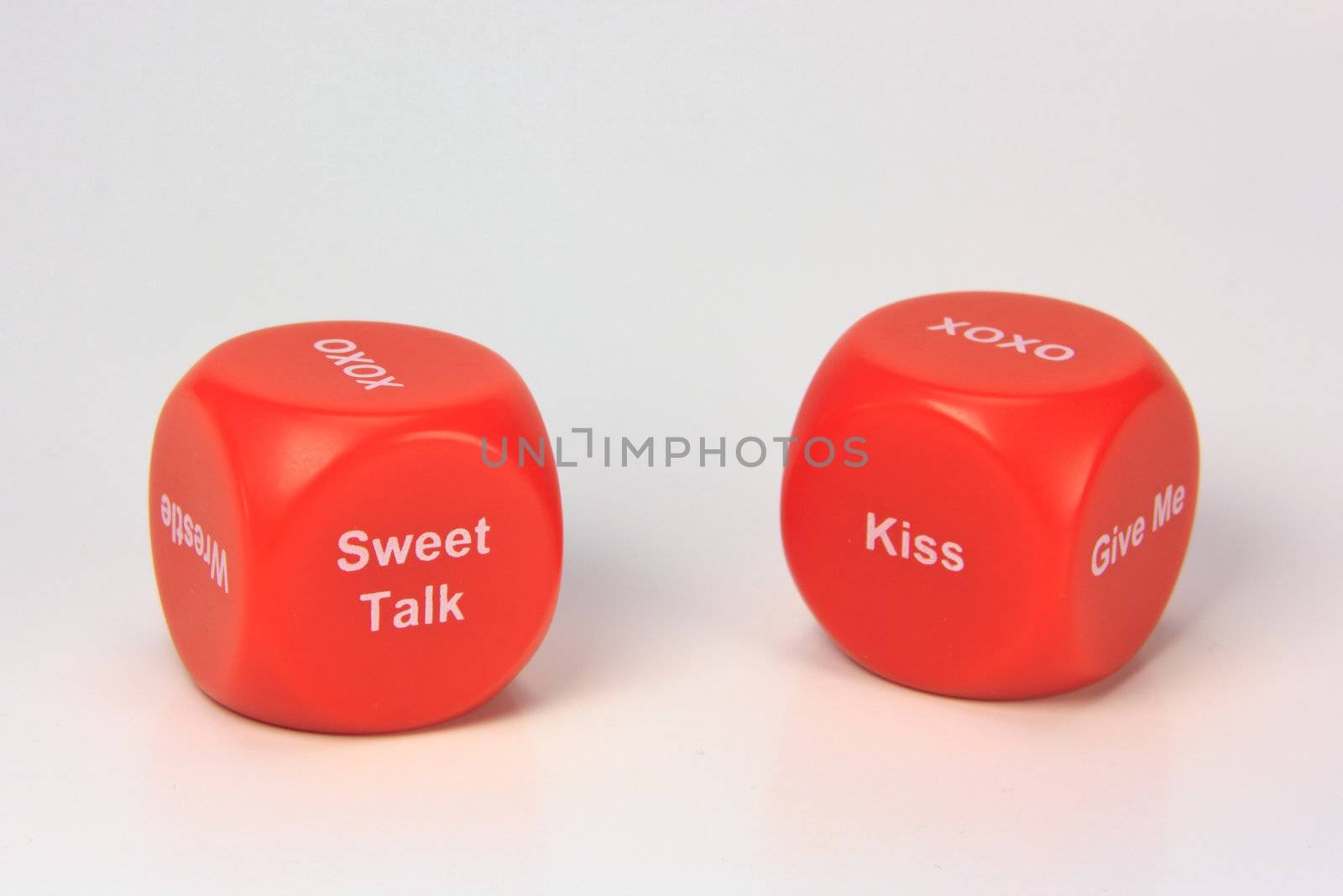 red cubes with chances to win love expression. on white