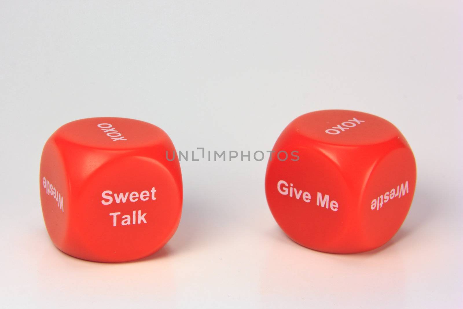 red cubes with chances to win love expression. on white