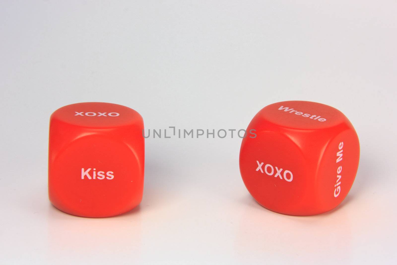 red cubes with chances to win love expression. on white