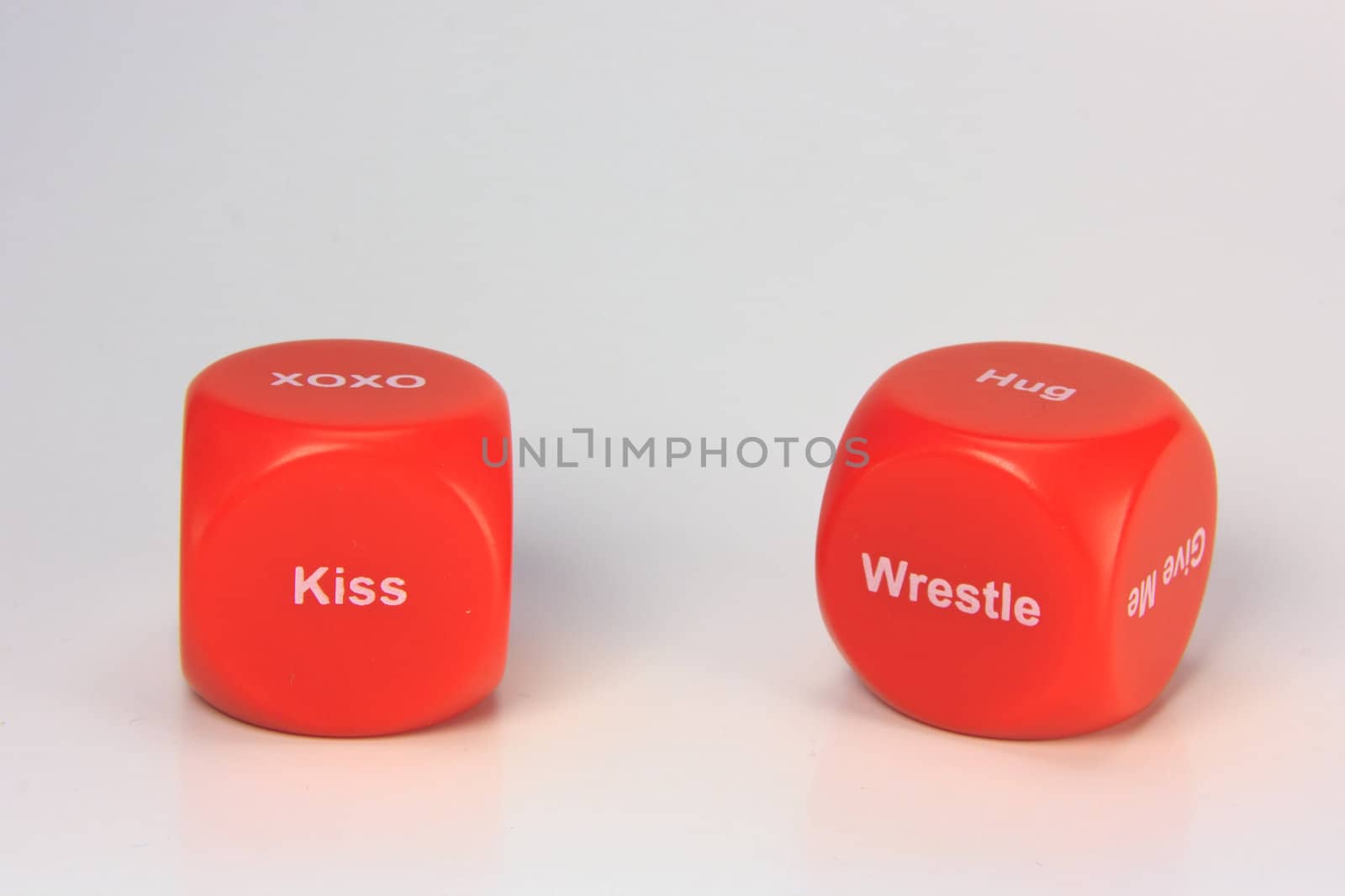 red cubes with chances to win love expression. on white