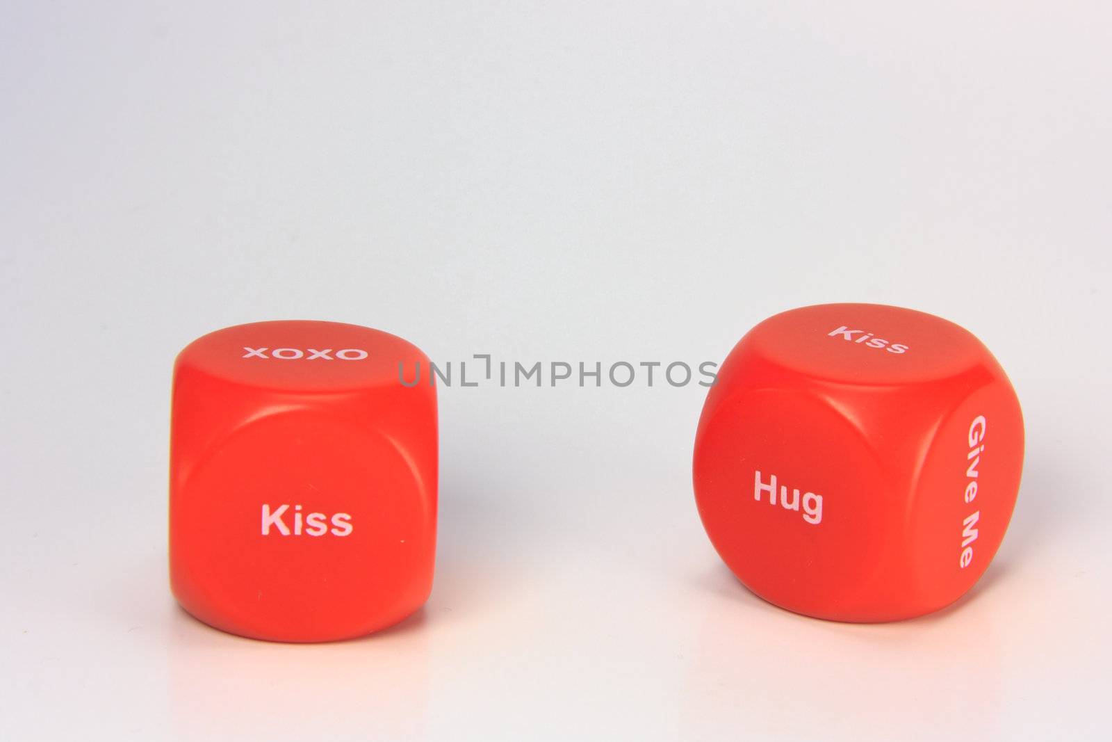 red cubes with chances to win love expression. on white