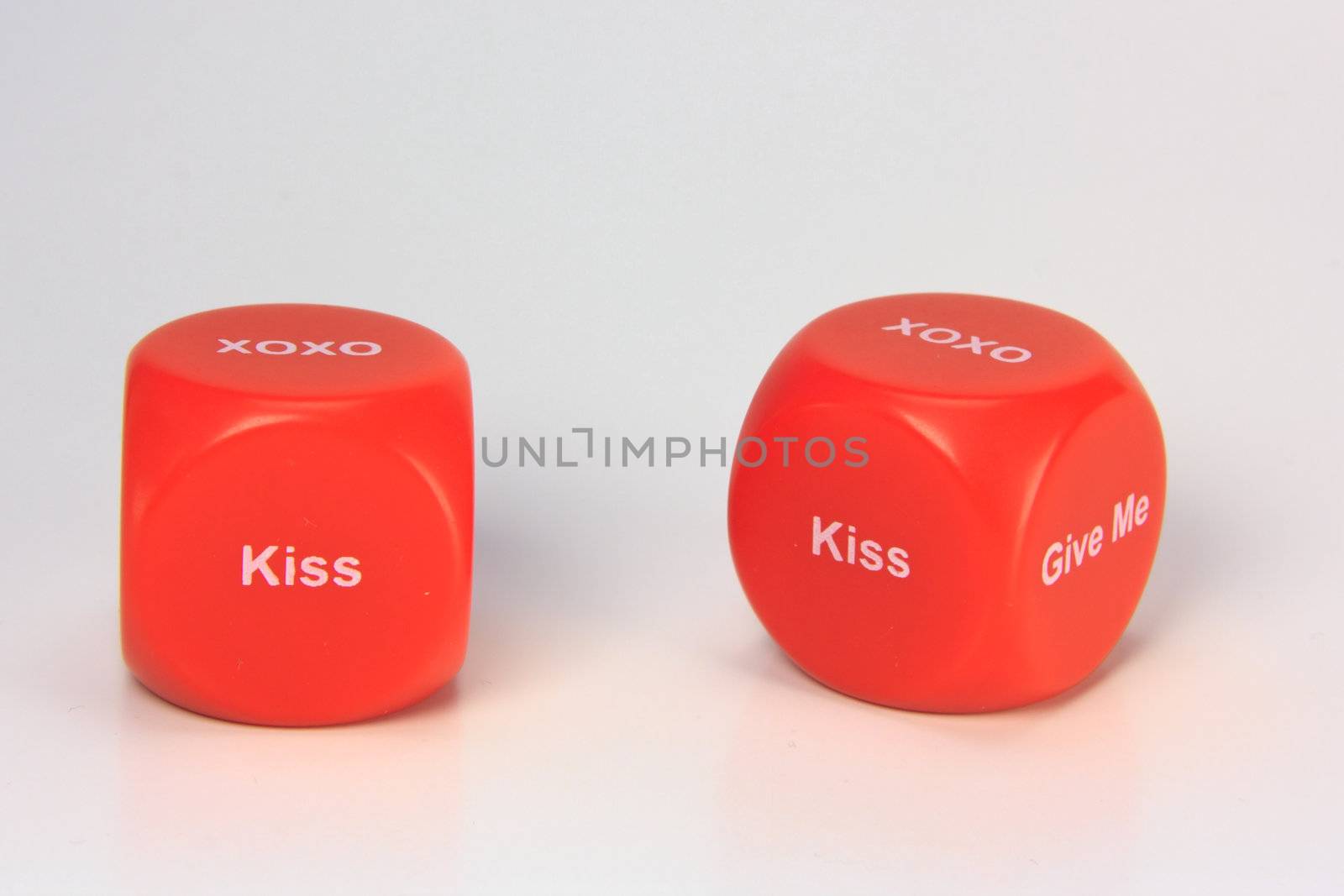 red cubes with chances to win love expression. on white