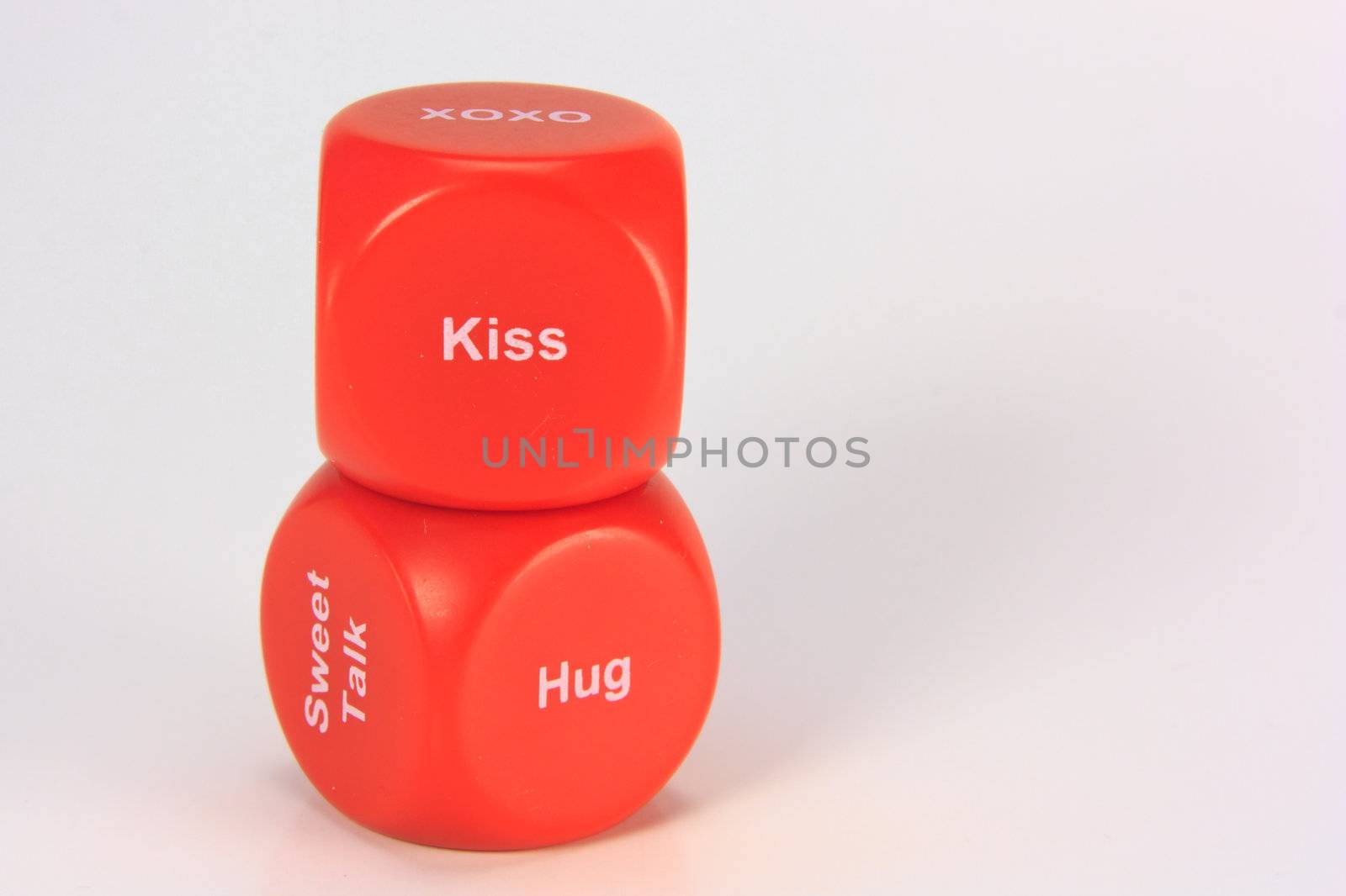 red cubes with chances to win love expression. on white