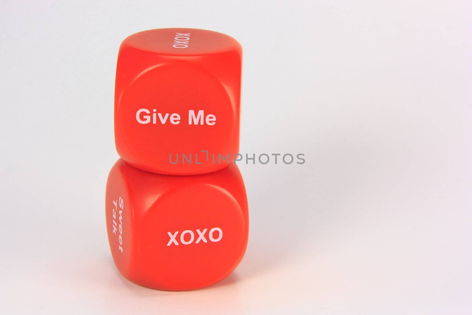 red cubes with chances to win love expression. on white