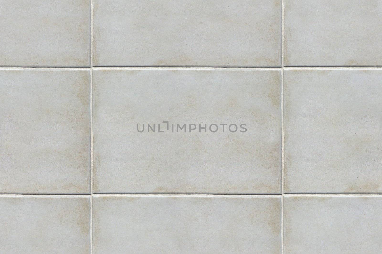 Ivory color tiles texture that perfectly loop horizontally and vertically