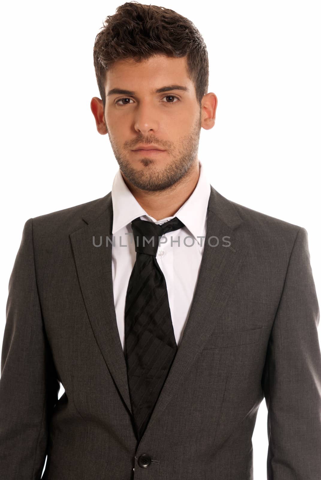 Young businessman looking serious isolated on white background by dgmata