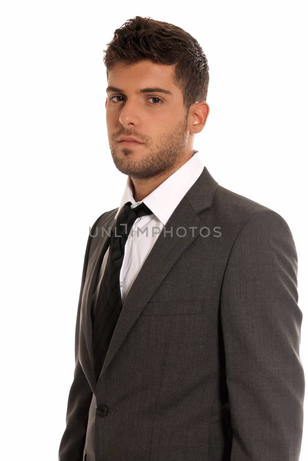 Young businessman looking serious isolated on white background