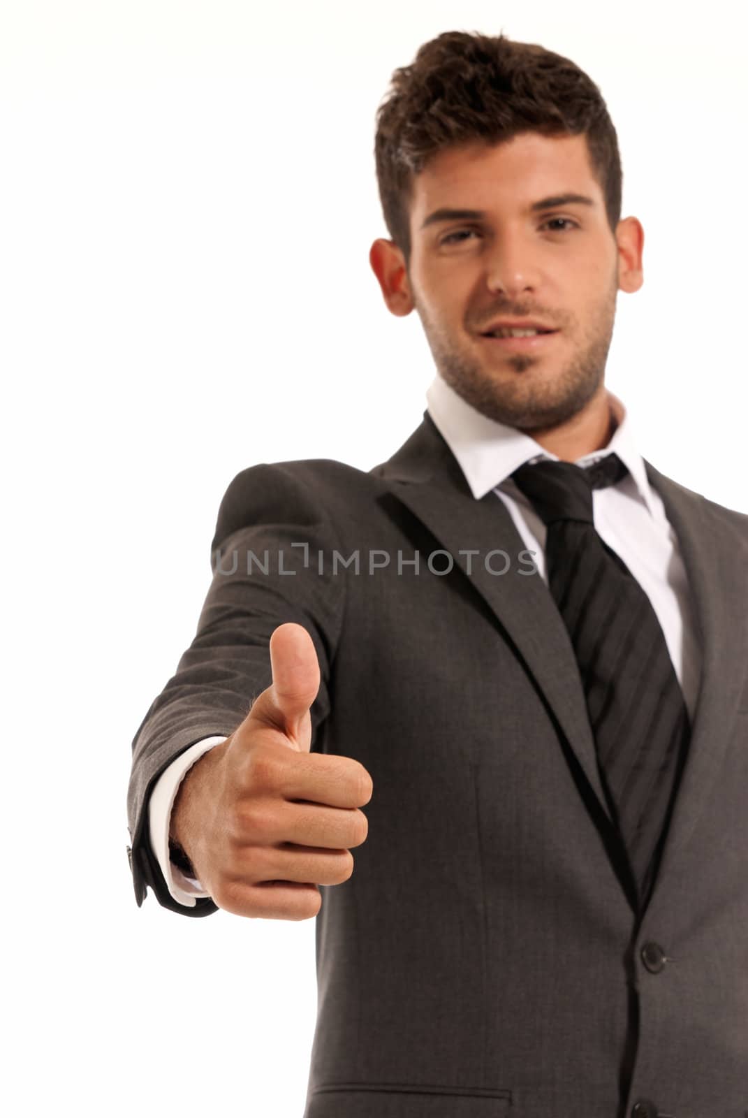 Young businessman ok symbol gesture, isolated on white background by dgmata