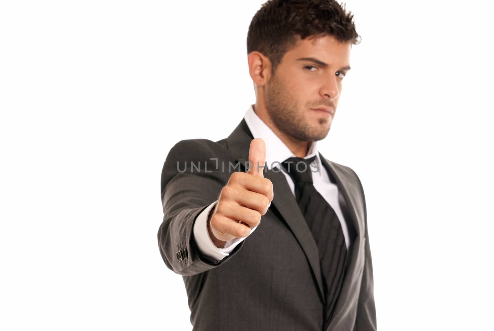 Young businessman ok symbol gesture, isolated on white background. Focused on hand