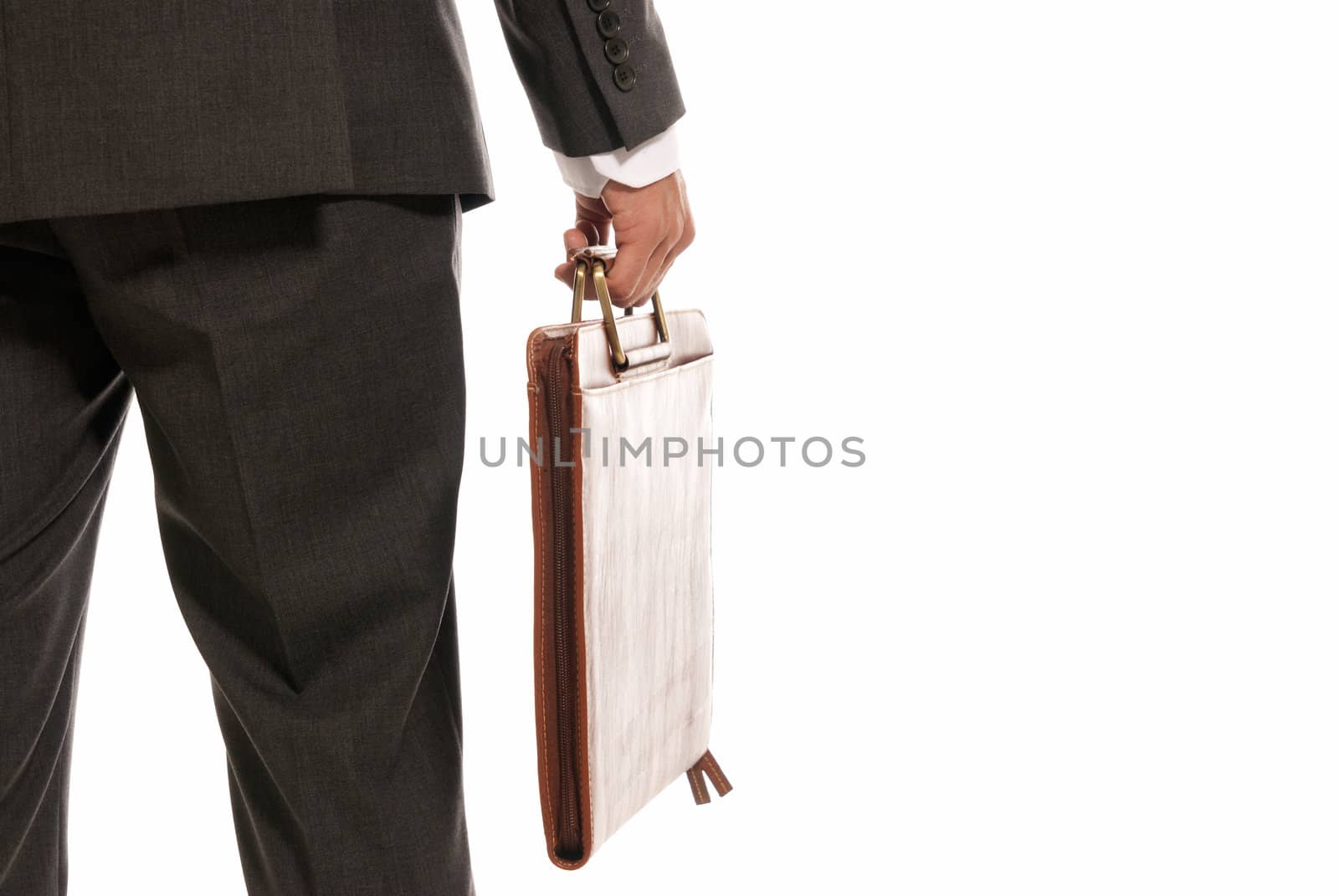 Unrecognizable businessman back with suitcase copy-space isolated on white background by dgmata