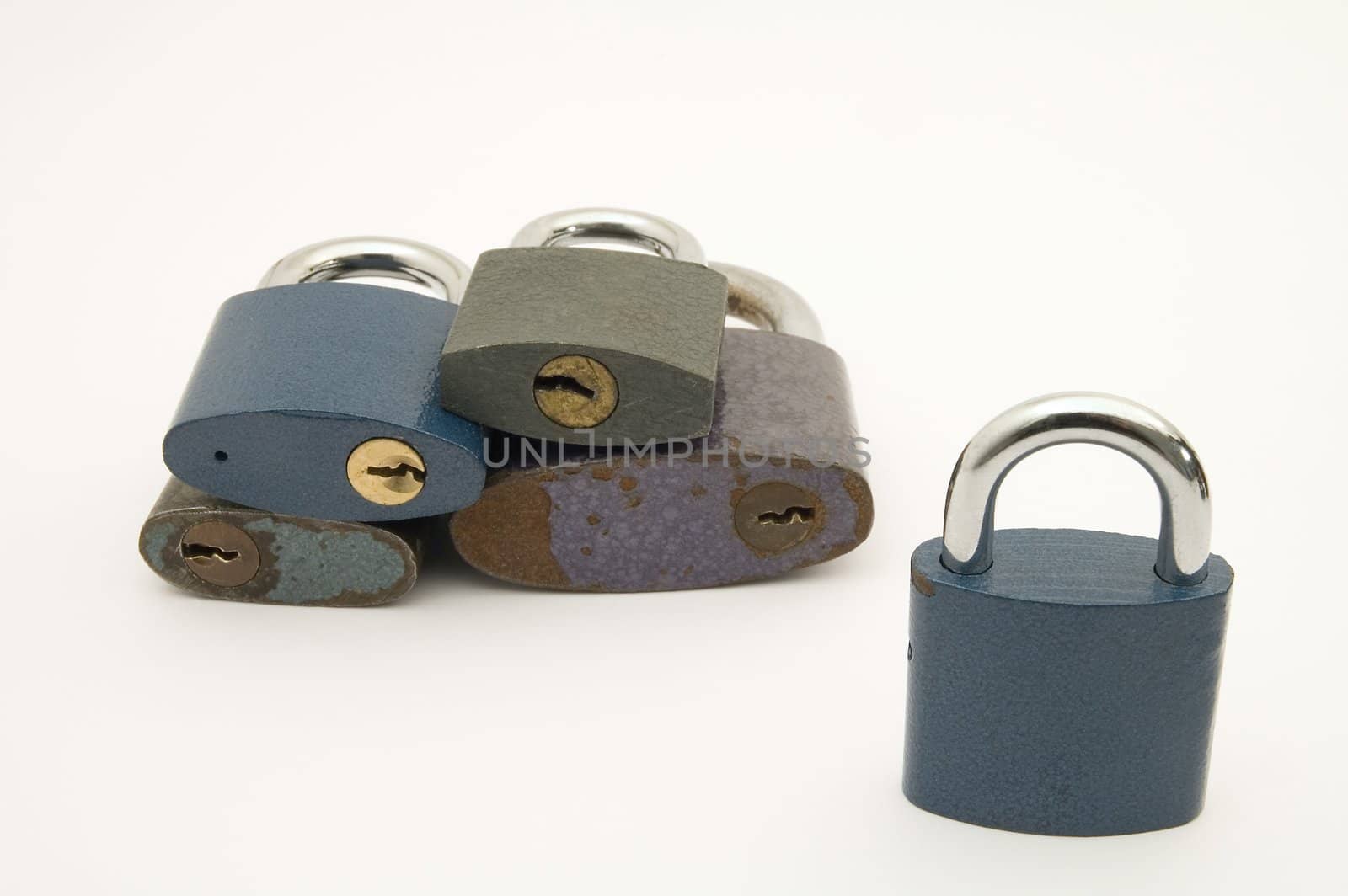 five old locks isolated on white background