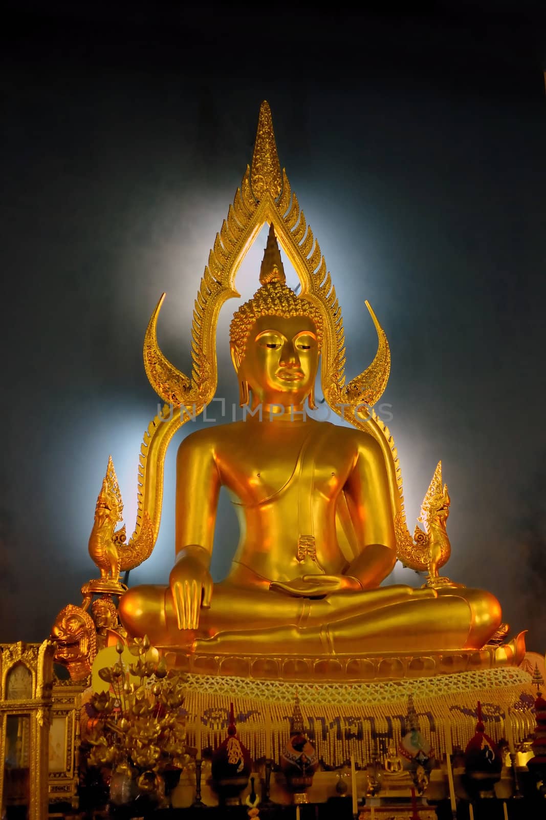 Beautiful and peaceful golden buddha with backlight
