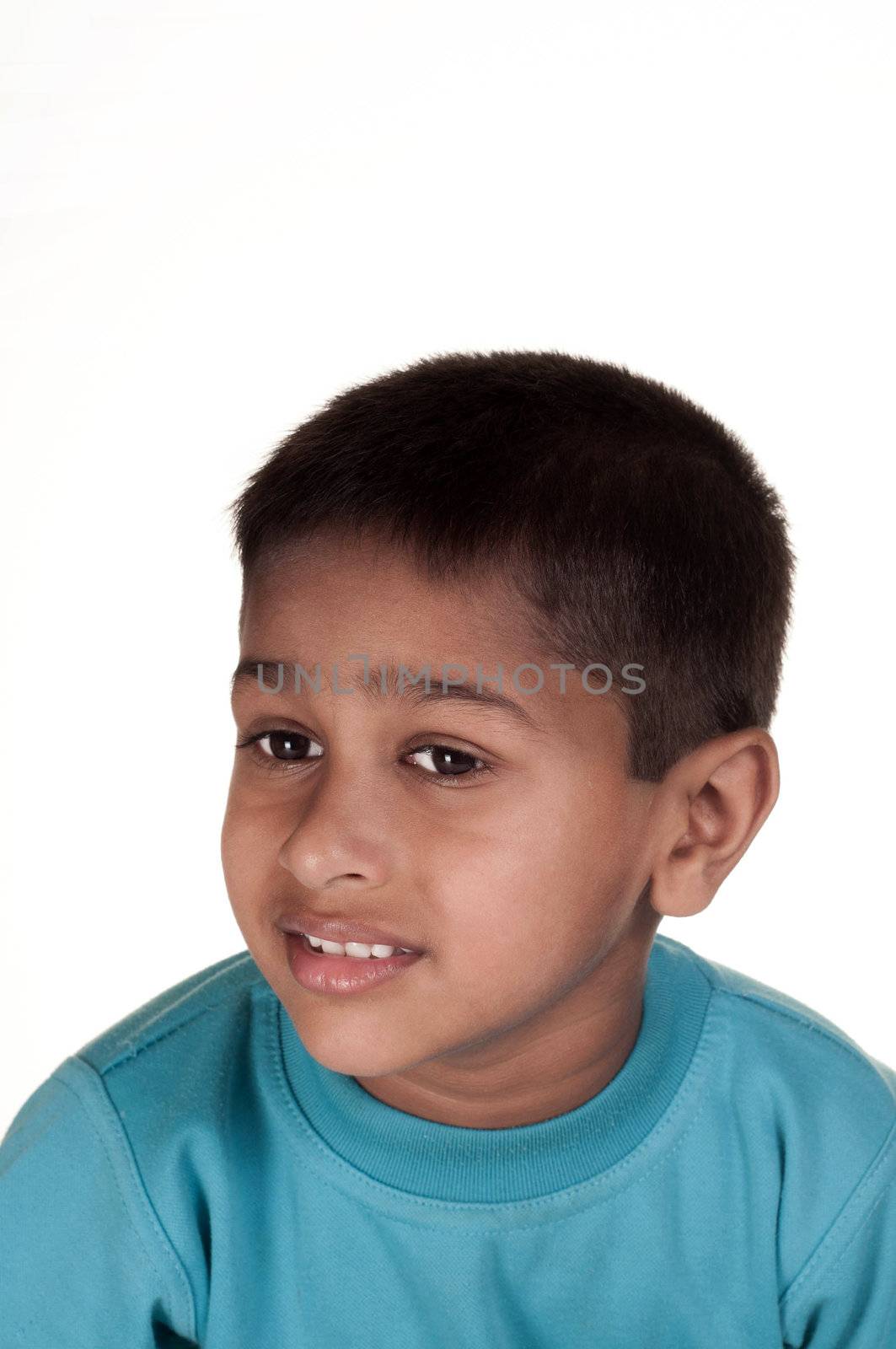 Photo of adorable young boy looking at camera